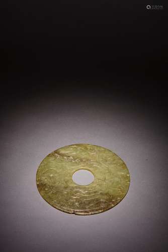 A CELADON JADE 'PHOENIX' DISC BI