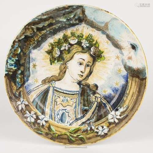 A majolica decorative charger with polychromed allegorical p...