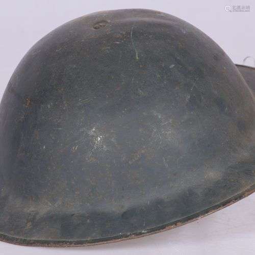 A British/ Belgian WOII helmet with inner lining, ca. 1945.