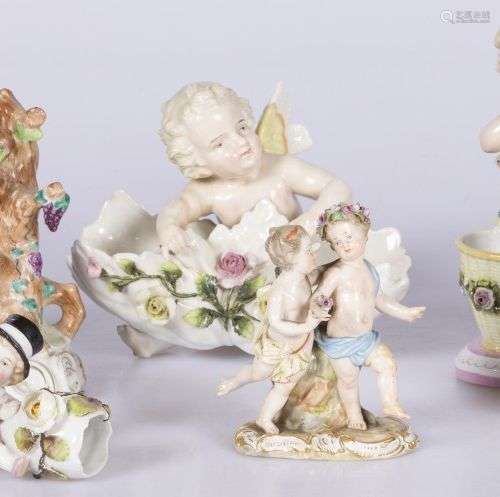 A lot of various porcelain items including a sculpture group...