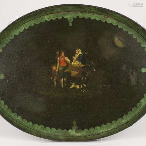 An oval tole tin serving tray with polychromed scene of a tr...