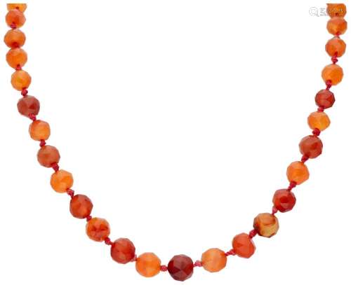 Single strand carnelian necklace with a 14K. yellow gold clo...