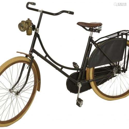 A ladies bicycle with wooden rims and fenders, Holland, 20th...