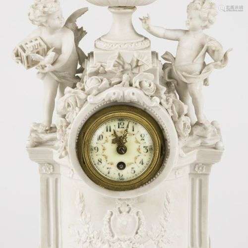 A French white biscuit overmantle clock with amor figurines ...