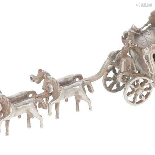 Miniature royal carriage with six horses in silver.