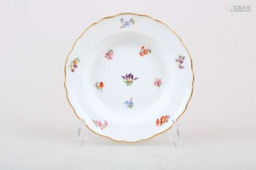 A porcelain plate with floral decor. Meissen, 1st half of th...