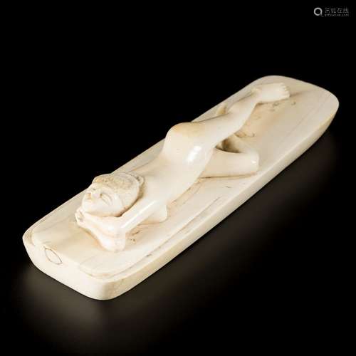 An ivory sculpture of a reclining woman, DRC, first half 20t...