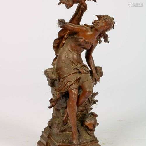 After Louis Auguste Moreau (1855-1919), A statue of a lady w...