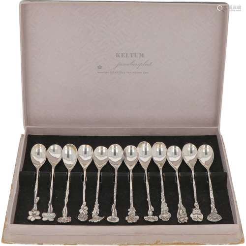 (12) piece set of silver flower teaspoons.