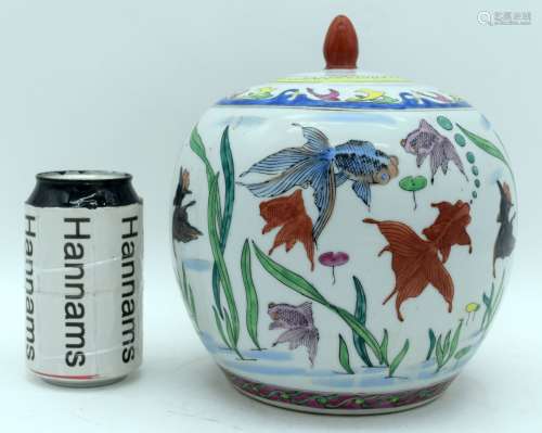 A Chinese porcelain polychrome lidded ginger jar decorated w...