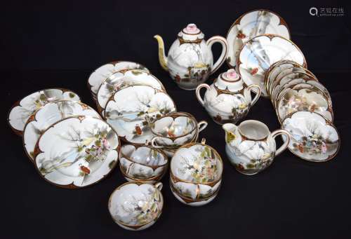 A Japanese hand painted porcelain tea set. (34)