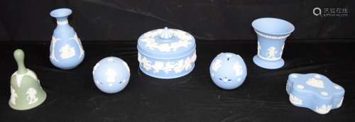 A collection of Wedgwood Jasperware; lidded pots, vases, bel...