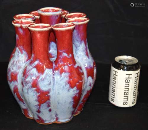 A Chinese porcelain flambe multi neck flower vase. 22cm