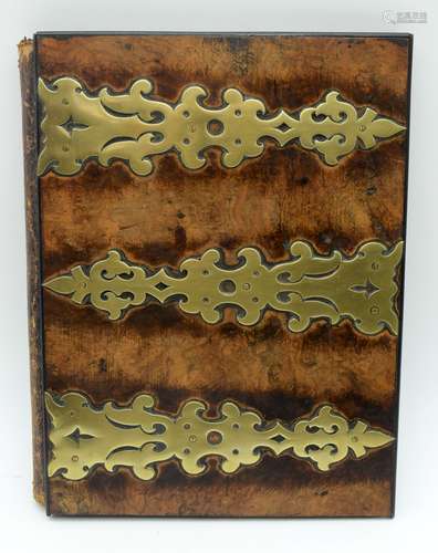 An antique leather and burr wood blotter with brass decorati...