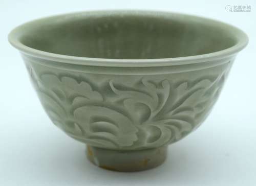 A small Chinese porcelain Yaozhou celadon bowl 7 x 11.5cm.
