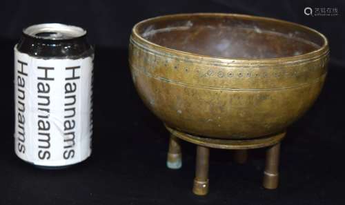 A small Tibetan Singing Bowl with associated stand. 13 x 16c...