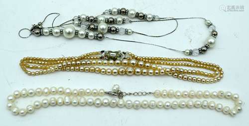 A pearl necklace together with two other sets of paste pearl...