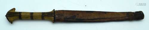 A bone handled dagger in a leather sheath 33cm . (2).