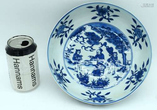 A Chinese porcelain blue and white bowl decorated with figur...