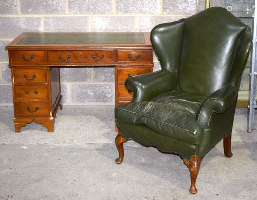 A George III style leather chair and leather topped 9 draw d...