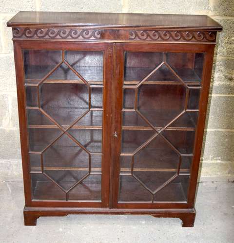 A Mid Century Walnut glass panelled book case 107 x 91 x 29 ...