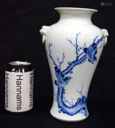A Chinese porcelain twin handled blue and white vase decorat...