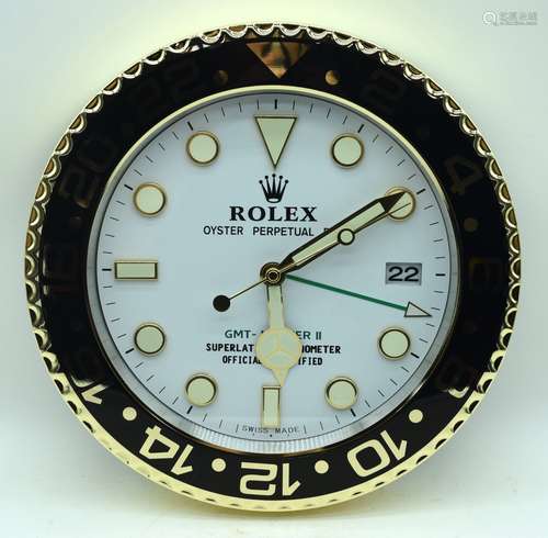 A contemporary Rolex dealership clock 34cm