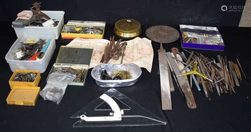 A collection of Clock repairers tools and spare parts (Qty).