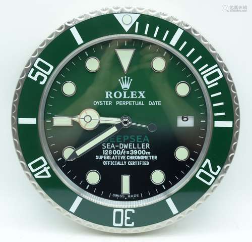 A contemporary Rolex dealership clock 34cm