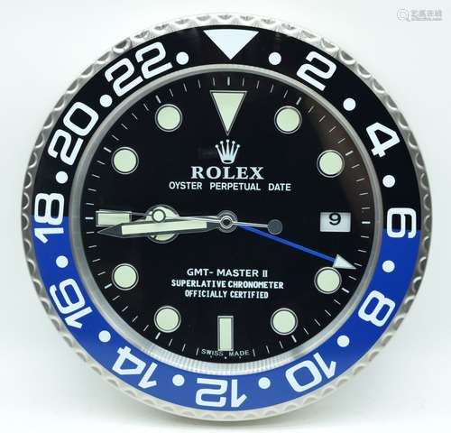 A contemporary Rolex dealership clock 34cm