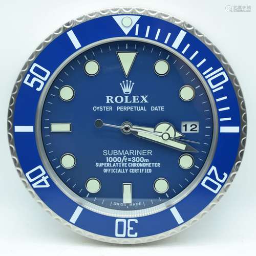 A contemporary Rolex dealership clock 34cm