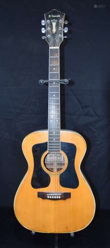 A 1960's full size Kiso Suzuki 9510 steel string acoustic gu...