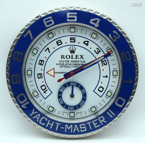 A contemporary Rolex dealership clock 34cm