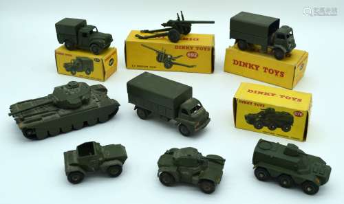 A collection of boxed and unboxed Dinky military models 13cm...