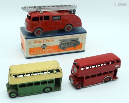 A boxed Dinky Fire Engine 555 together with two Dinky buses....