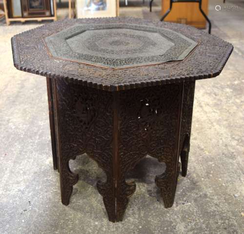 A 19th Century carved wooden Indian table with an open work ...