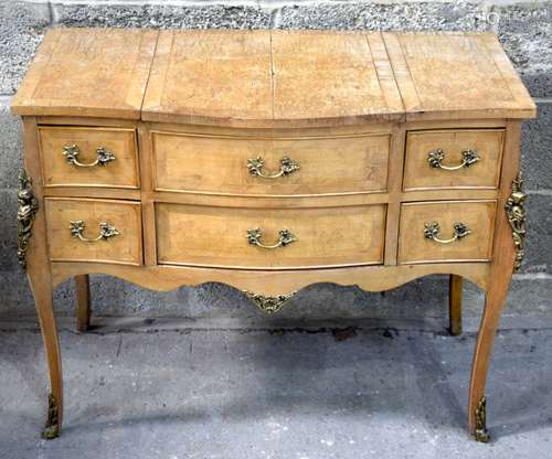 A Wooden veneered French cabinet with later legs 74 x 92 x 4...