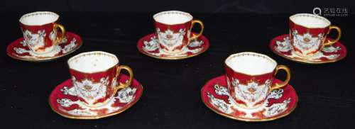 A collection of Royal Crown Derby porcelain tea cups & sauce...