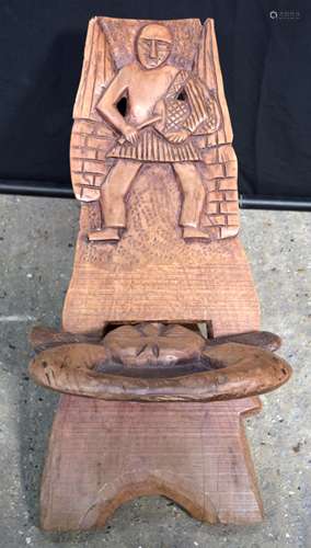 An African tribal carved stool 60 x 40 cm .