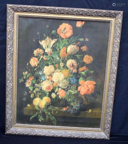 A framed oleograph on canvas of flowers by Ruysch 50 x 75cm.