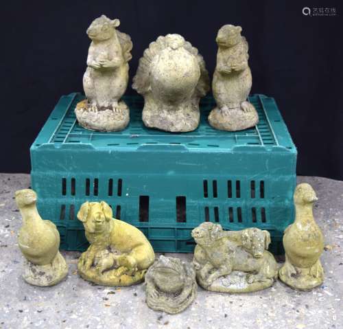A collection of stone composite animal/birds garden statues ...