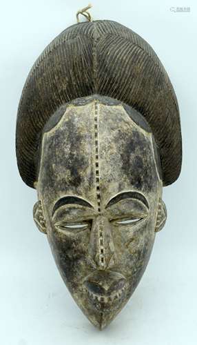 An African Igbo style Tribal mask 50 x 26cm.