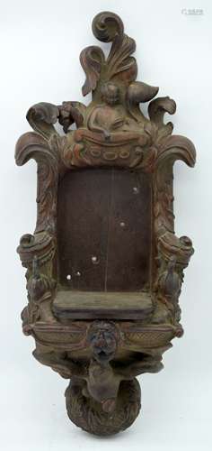 A 19th century carved black Forest wall mount signed with mo...