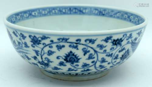 A Chinese blue and white porcelain bowl decorated with drago...