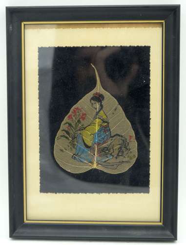 A framed Japanese leaf picture of a female 18 x 13cm
