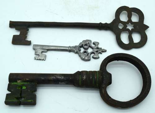 A large antique metal key together with two other keys 29cm ...