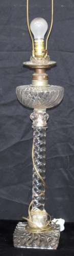 A Victorian glass oil lamp converted to electric . 94 x 16 c...