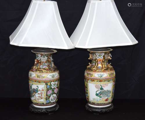 A pair of Chinese porcelain polychrome vases converted to la...