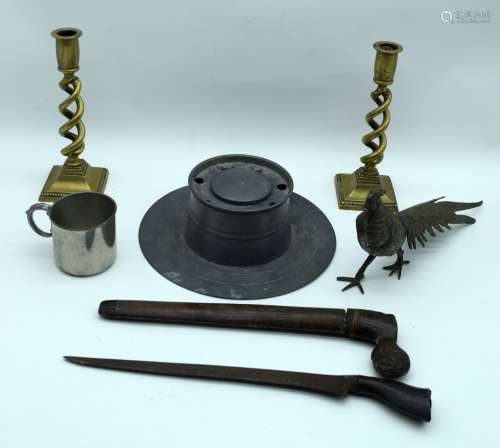 A large pewter inkwell, brass candle sticks, pewter cup, woo...