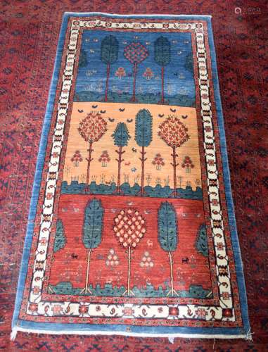 A Kalim rug 215 x 104cm.